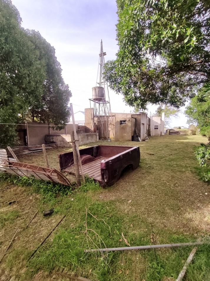 CASA CON TERRENO GRANDE